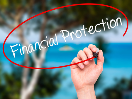 Man Hand writing Financial Protection with black marker on visual screen. Isolated on nature. Business, technology, internet concept. Stock Photoの写真素材