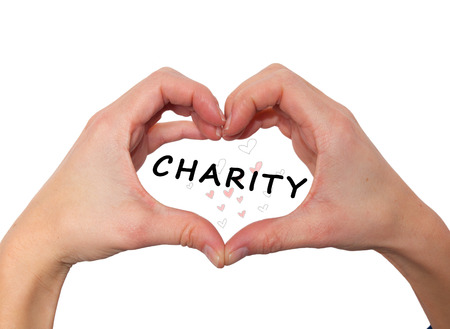 close up of woman hands in heart shape. Charity sign inside. Charity concept. Stock Imageの写真素材