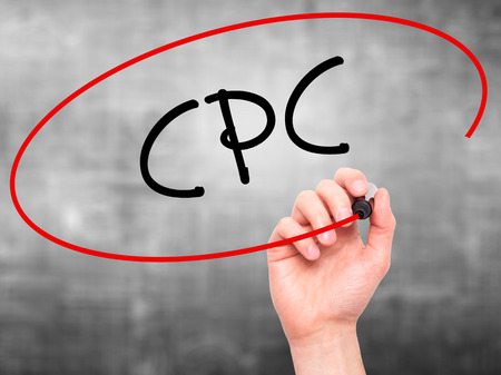 Man Hand writing CPC (Cost Per Click)  with black marker on visual screen. Isolated on background. Business, technology, internet concept. Stock Photoの写真素材