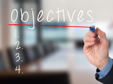 Man Hand writing Objectives to do list with marker. Business, internet concept. stock Imageの写真素材