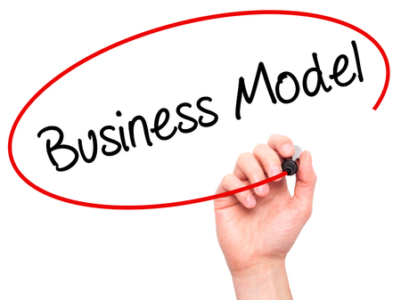 Man Hand writing Business Model with black marker on visual screen. Isolated on background. Business, technology, internet concept. Stock Photoの写真素材