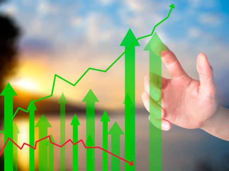 Businessman hand pressing Sales Growth Graph on virtual screen. Isolated on background. Sales concept. Stock Imageの写真素材
