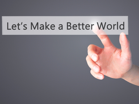 Let's Make a Better World  - Hand pressing a button on blurred background concept . Business, technology, internet concept. Stock Photoの写真素材