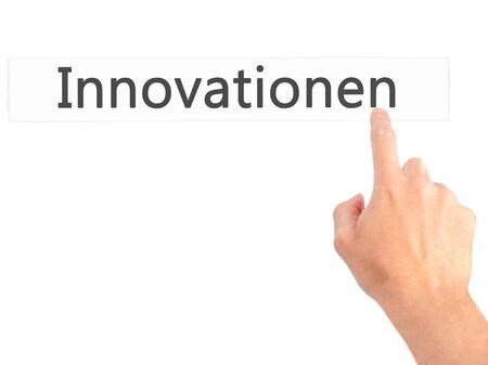 Innovationen (Innovationin German) - Hand pressing a button on blurred background concept . Business, technology, internet concept. Stock Photoの写真素材