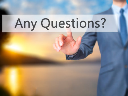 Any Questions - Businessman press on digital screen. Business,  internet concept. Stock Photoの写真素材