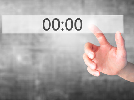 00:00 - Hand pressing a button on blurred background concept . Business, technology, internet concept. Stock Photoの写真素材