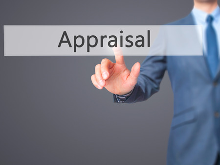Appraisal - Businessman click on virtual touchscreen. Business and IT concept. Stock Photoの写真素材