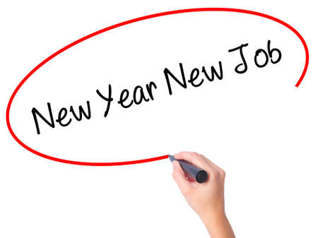 Women Hand writing New Year New Job with black marker on visual screen. Isolated on white. Business, technology, internet concept. Stock Photoの写真素材