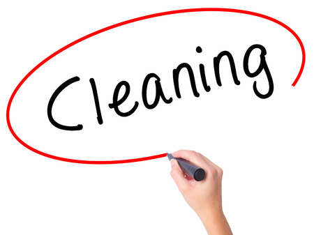 Women Hand writing Cleaning with black marker on visual screen. Isolated on white. Business, technology, internet concept. Stock Imageの写真素材