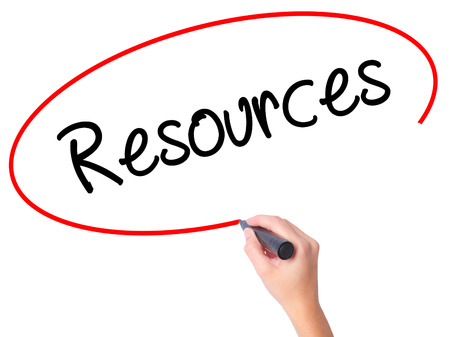 Women Hand writing Resources with black marker on visual screen. Isolated on white. Business, technology, internet concept. Stock Photoの写真素材