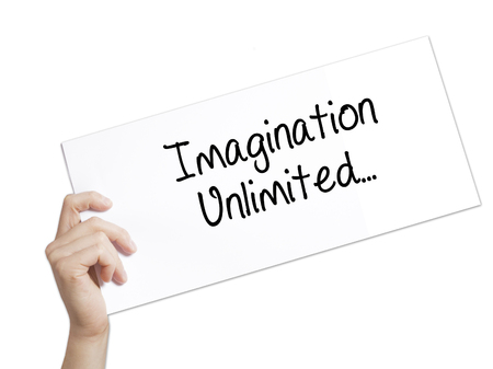 Paper with text Imagination Unlimited... . Man Hand Holding Sign on white paper. Isolated on white background.   Business concept. Stock Photoの写真素材