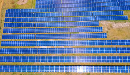 solar panels with the sunny sky. Blue solar panels. background of photovoltaic modules for renewable...
