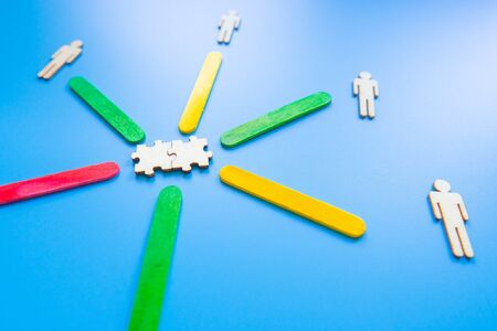 Wooden blocks with businessman icon on blue background, Organisation structure, social network, Leadership, team building, recruitment business, management and human resources concepts. copy spaceの写真素材