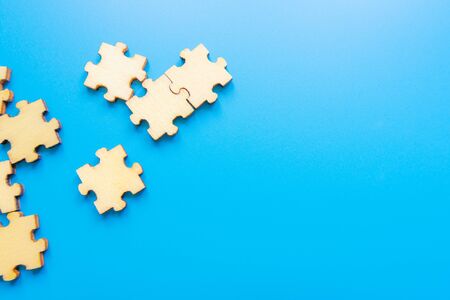 image of wooden blocks with people icons over blue table ,human resources and management concept....
