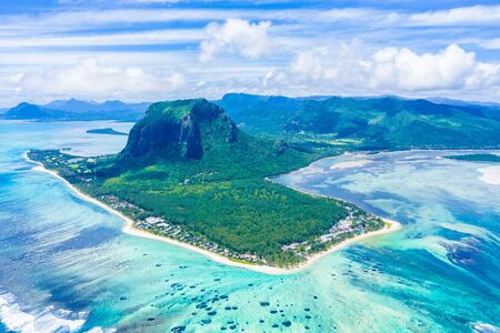 Aerial view of Mauritius island panorama and famous Le Morne Brabant mountain, beautiful blue lagoon and underwater waterfallの写真素材