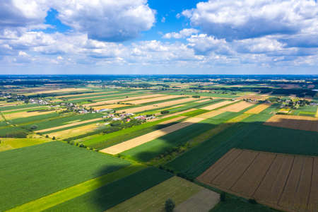 Aerial photo from flying drone of a beautiful nature landscape with growing healthy. Beauty scenery with farm.の写真素材