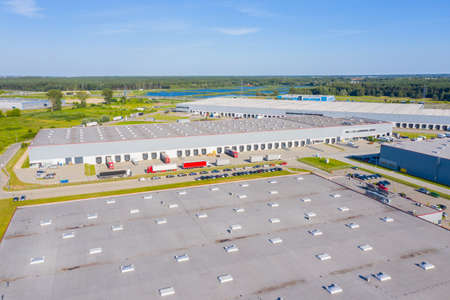 Aerial view of warehouse storages or industrial factory or logistics center from above. Aerial view...