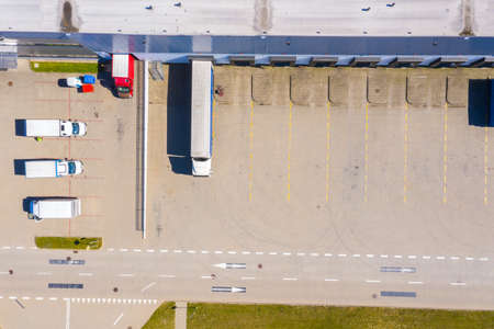 Huge shopping mall of household goods with a lot of parking space, aerial view