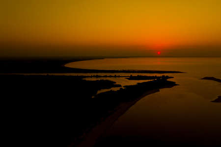 Aerial photo from flying drone of a fascinating nature landscape with dramatic evening sunset sky...
