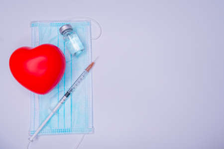 Medical drug vaccine syringe needle hypodermic injection treatment on map world, Medical concept...
