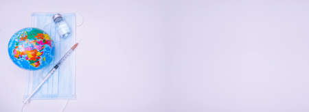 Medical drug vaccine syringe needle hypodermic injection treatment on map world, Medical concept...
