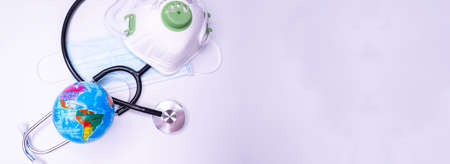 Pandemic concept, close up of scientist injecitng vaccine into the earth Copy Spaceの写真素材