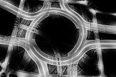 Aerial top view of Modern transportation with Expressway, Road and Roundabout, Road traffic, multilevel junction highway-Top view in asia. Important infrastructure for transport. Black and whiteの写真素材