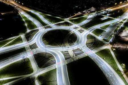 Aerial top view of Modern transportation with Expressway, Road and Roundabout, Road traffic, multilevel junction highway-Top view in asia. Important infrastructure for transport.の写真素材
