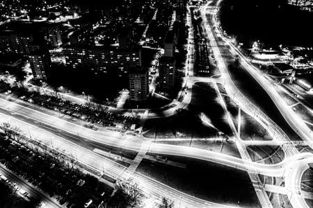 Aerial top view of Modern transportation with Expressway, Road and Roundabout, Road traffic, multilevel junction highway-Top view in asia. Important infrastructure for transport.の写真素材