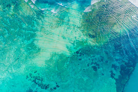 Aerial view to ocean waves. Blue water background. Dramatic colors photo.の写真素材
