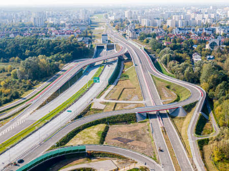 Highway or Freeway road. Wide road with many lanes. Highway for any transportation. Road for cars...