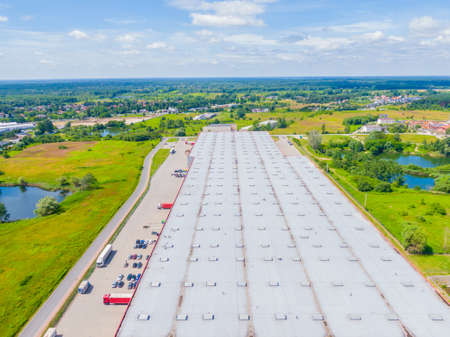 Warehouse storages or industrial factory or logistics center from above. Aerial view of industrial...