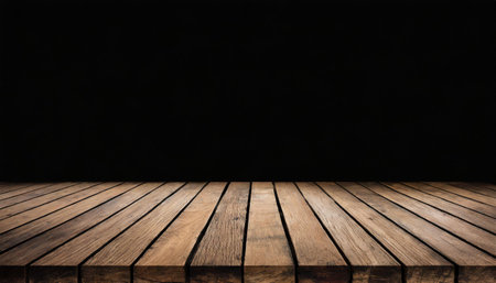 Old wood table with dark brown wall blurred background.の素材