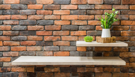 wooden plank shelf with black brick wall backgroundの素材