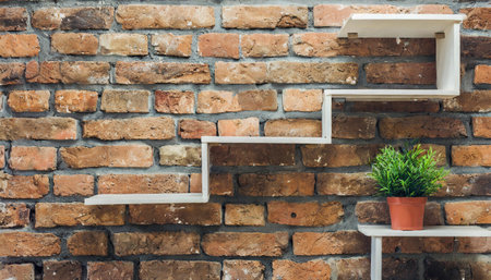 wooden plank shelf with black brick wall backgroundの素材