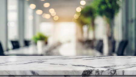 White marble stone tabletop and blurred bokeh office interior space background - can used for display or montage your products.の素材