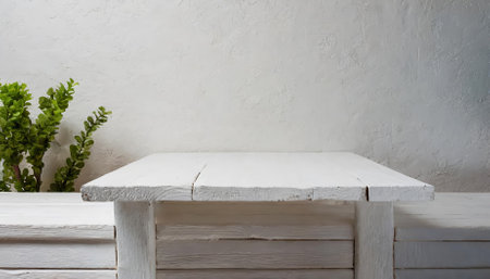 High-quality image showcasing a simple, empty wooden white table positioned before a clean white wall background, perfect for product display, e-commerce use, branding visuals, and creativeの素材