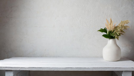 A high-quality image featuring a clean wooden white table and a seamless white wall background. Perfect for product display montages, e-commerce showcases, or modern design projects with aの素材