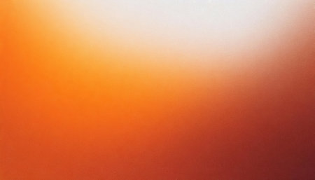 A visually appealing orange-to-white gradient background featuring a smooth color transition with a grainy texture and light noise. Perfect for digital design, branding, and creative projects.の素材