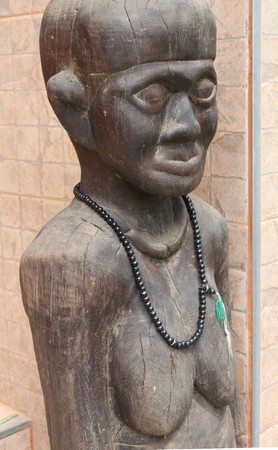 Picture of local Lao P.D.R. old woman wood carvingの写真素材