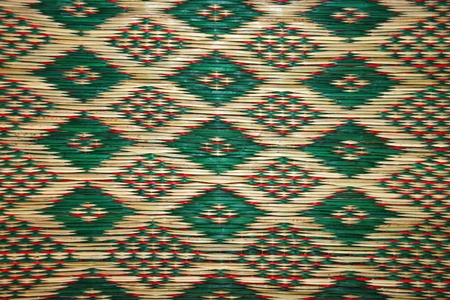 Mat made from weaved dried sedge background and textureの写真素材