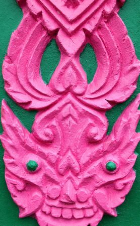 Buddhist art stucco on wall or pillar of church, temple and sanctuaryの写真素材