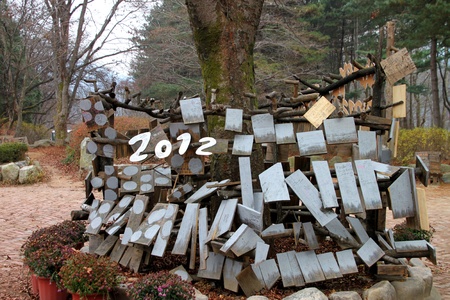 NAMINARA REPUBLIC, KOREA - NOVEMBER 26 : The happy new year 2012 wooden sign is locating for welcome...