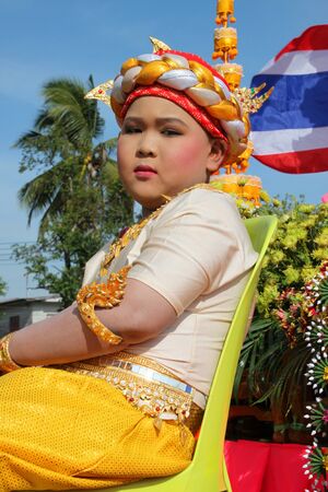 BORABUE, MAHASARAKHAM - The unidentified boy is in local sports parade and festival season on DECEMBER 22, 2011 at sports ground, Borabue, Mahasarakham, Thailand.のeditorial素材