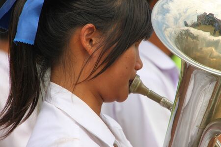 BORABUE, MAHASARAKHAM - DECEMBER 22 : The unidentified paraders are in local sports parade grand opening and festival season on DECEMBER 22, 2011 at sports ground, Borabue, Mahasarakham, Thailand.のeditorial素材