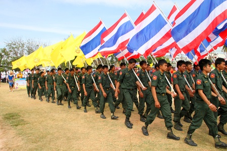 BORABUE, MAHASARAKHAM - DECEMBER 22 : The unidentified paraders are in local sports parade grand opening and festival season on DECEMBER 22, 2011 at sports ground, Borabue, Mahasarakham, Thailand.のeditorial素材