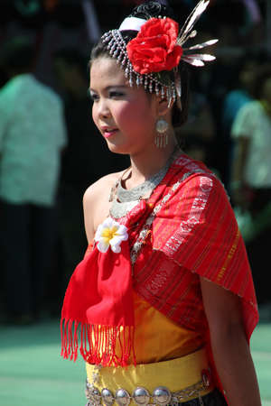 BORABUE, MAHASARAKHAM - JANUARY 6 : The unidentified dancer is performing in Rice Celebration Festival on January 6, 2012 at Borabue Local Administration Plaza, Borabue, Mahasarakham, Thailand.のeditorial素材