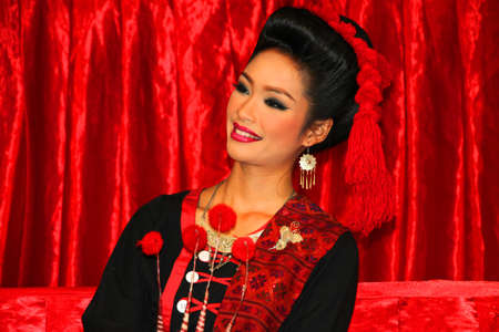 BORABUE, MAHASARAKHAM - JANUARY 6 : The unidentified dancer is performing in Rice Celebration Festival on January 6, 2012 at Borabue Local Administration Plaza, Borabue, Mahasarakham, Thailand.のeditorial素材