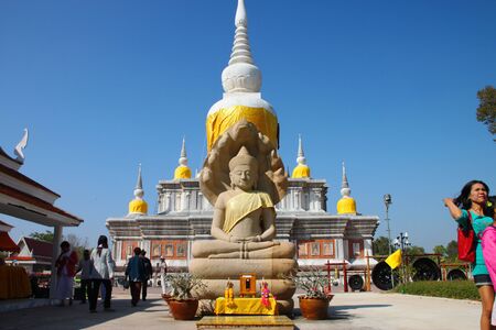 NADUN, MAHASARAKHAM - DECEMBER 27 : The unidentified tourists are traveling for worship monk,  Buddha statue and stupa on December 27, 2011 at Nadun Stupa Area, Nadun, Mahasarakham, Thailand.のeditorial素材