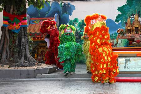 UDON THANEE, THAILAND - JANUARY 26 : The unidentified buddhists are performing lions show on January 26, 2012 at The shrine, Udon Thanee, Thailand.のeditorial素材
